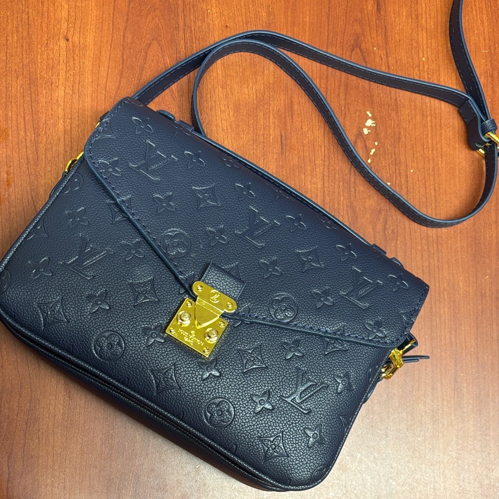 Louis Vuitton Navy Crossbody Bag with Gold Accents